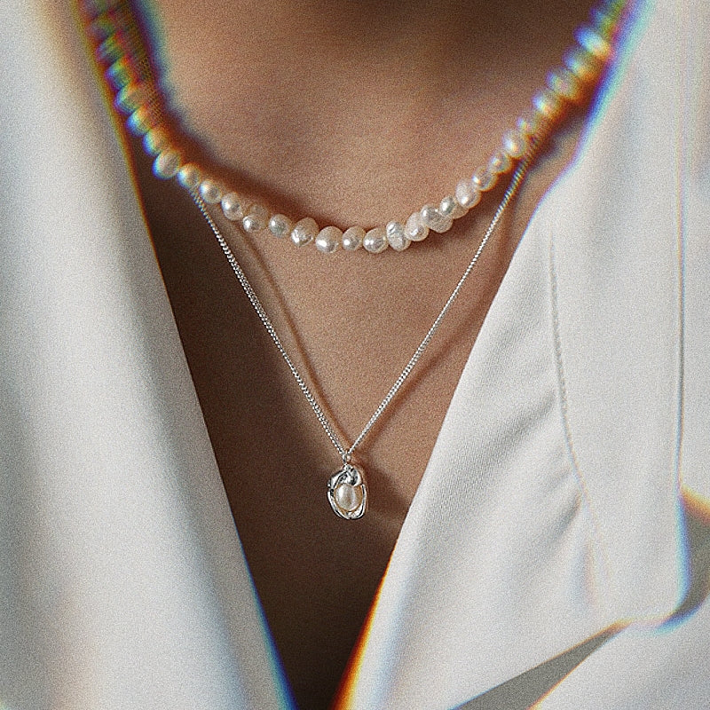 A female model wearing Glenda Baroque Freshwater Pearl Pendant Necklace 