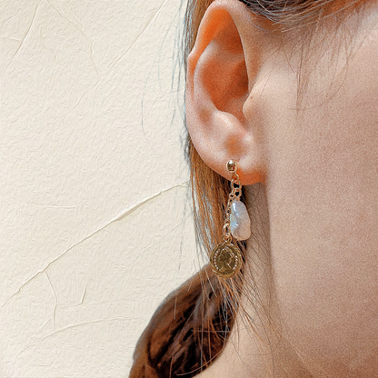 A female model wearing Baroque Pearl Drop Earring with Vintage Gold Coin Leanne