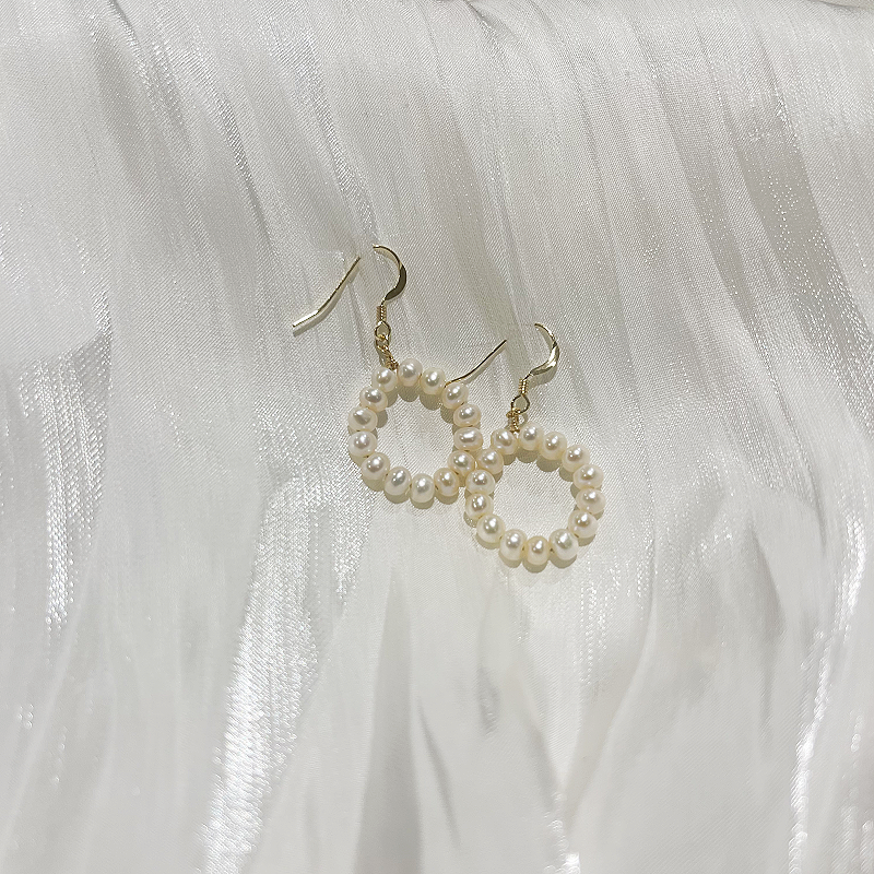 Classic Freshwater Pearl Hoop Earrings 14k Gold Filling Fanny on white satin fabric image close look