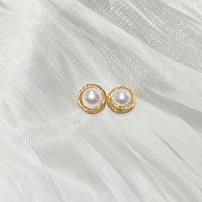 Bird's Nest Pearl Stud Earrings Sarah  product image on white satin fabric with more detail