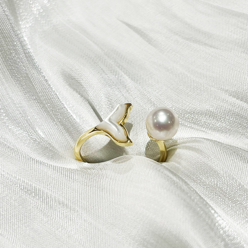 Mermaid Freshwater Pearl 6.5-7mm Open Ring Sadie on white satin fabric