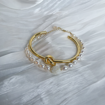 Love knot bangle with pearl bracelet studio image