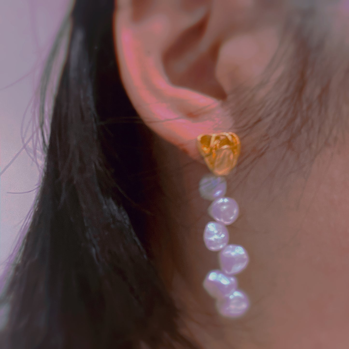 A girl wearing Satin Rose Petal Baroque Sea Pearl Drop Earrings Yolanda image