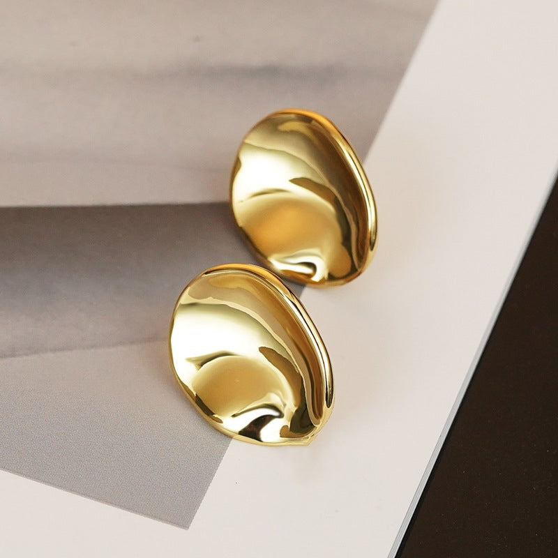 Willow gold stud earrings in yellow