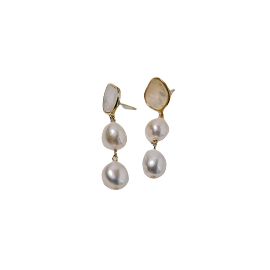 pearl drop earrings in white background